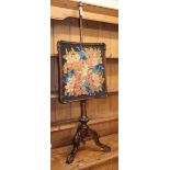 A Victorian mahogany adjustable tripod pole screen with tapestry banner