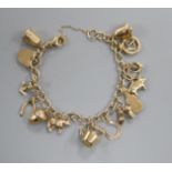 A 9ct gold charm bracelet, hung with fourteen assorted charms, including pan, bell and thimble.