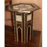 A Moorish mother of pearl inlaid hexagonal table W.48cm