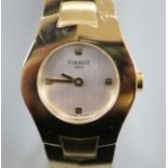 A lady's boxed Tissot watch.