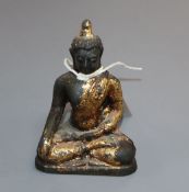 A 17th century Chinese gilded bronze Buddha