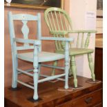 A Victorian child's green painted stick back elbow chair and one other (2)