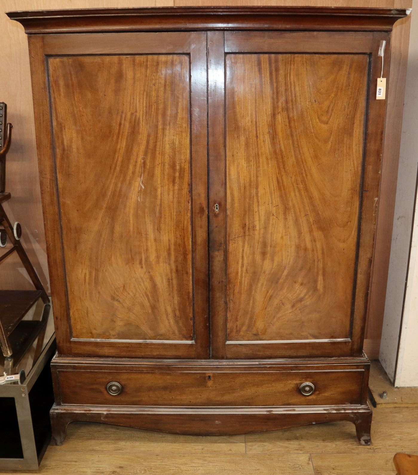 A George III mahogany hanging press cupboard W.121cm