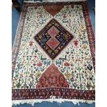 A Persian ivory ground rug 125 x 175cm