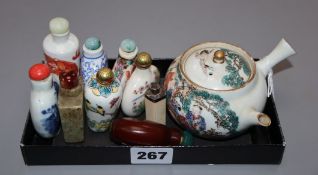 A group of Chinese snuff bottles and a Japanese wine pot