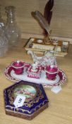 A Limoges porcelain hexagonal box and cover with Sevres style mark, a French faience inkwell and two