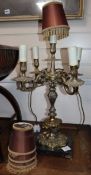 A gilt metal five light candelabrum, fitted as a table lamp