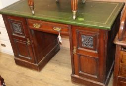 A late Victorian mahogany kneehole desk W.122cm