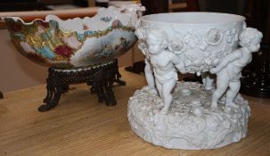 A Sitzendorf white glazed fruit bowl and a Haviland oval centrepiece on a bronze base (2)