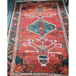 A Turkish red rug 140 x 200cm