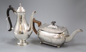 A late Victorian silver coffee pot, London, 1894 and a George III silver teapot, London, 1809, gross