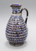 A Doulton Lambeth scaled and 'jewelled' jug, dated 1880, assistant's marks EW and Elisa Stock,