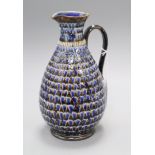 A Doulton Lambeth scaled and 'jewelled' jug, dated 1880, assistant's marks EW and Elisa Stock,