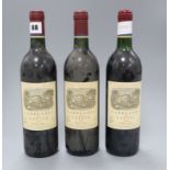 Three bottles Carruades de Lafite, 1990, Pauillac