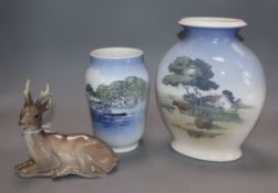 A Royal Copenhagen vase decorated with cattle in a landscape, a 'Silkeborg Byrad' vase and a model