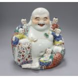A large Chinese famille rose figure of Budai H.28cm