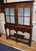 A 1920's Queen Anne revival walnut display cabinet W.116cm