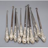 Eleven assorted mainly early 20th century silver handled button hooks.