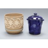 A Doulton silicon ware jardiniere and a blue glazed biscuit barrel and cover, shape 8510, jardiniere