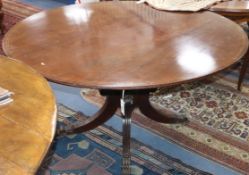 An inlaid breakfast table W.158cm