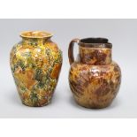 A Doulton Lambeth 'Autumn Leaves' globular jug, c.1895 and a similar ovoid vase,