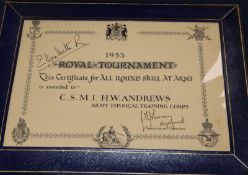 A 1953 Royal Tournament certificate, signed by Queen Elizabeth II, with a blue leather and silver