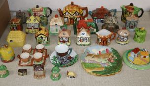 A quantity of cottage ceramic teapots / pastille burners