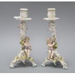 A pair of Sitzendof figural candlesticks H.23cm