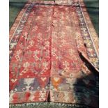 A Turkish red Kelim rug 345 x 200cm