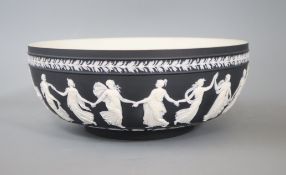 A Wedgwood 'Dancing Hours' black jasperware bowl, 20th century designed by John Flaxman D. 26cm