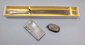 A silver calling card case, a silver sovereign / half sovereign case and a silver handled bread