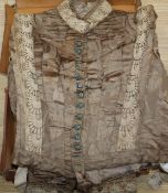 A Victorian satin and lace lady's blouse in a leather case