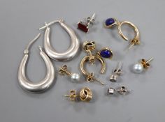 A pair of 9ct gold 'knot' earrings, two other pairs of 9ct gold earrings and three pairs of silver