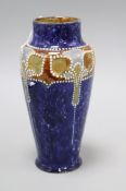 A Royal Doulton stoneware vase by Frank A. Butler, c.1905, height 20cm