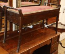 An Edwardian mahogany box seat duet piano stool