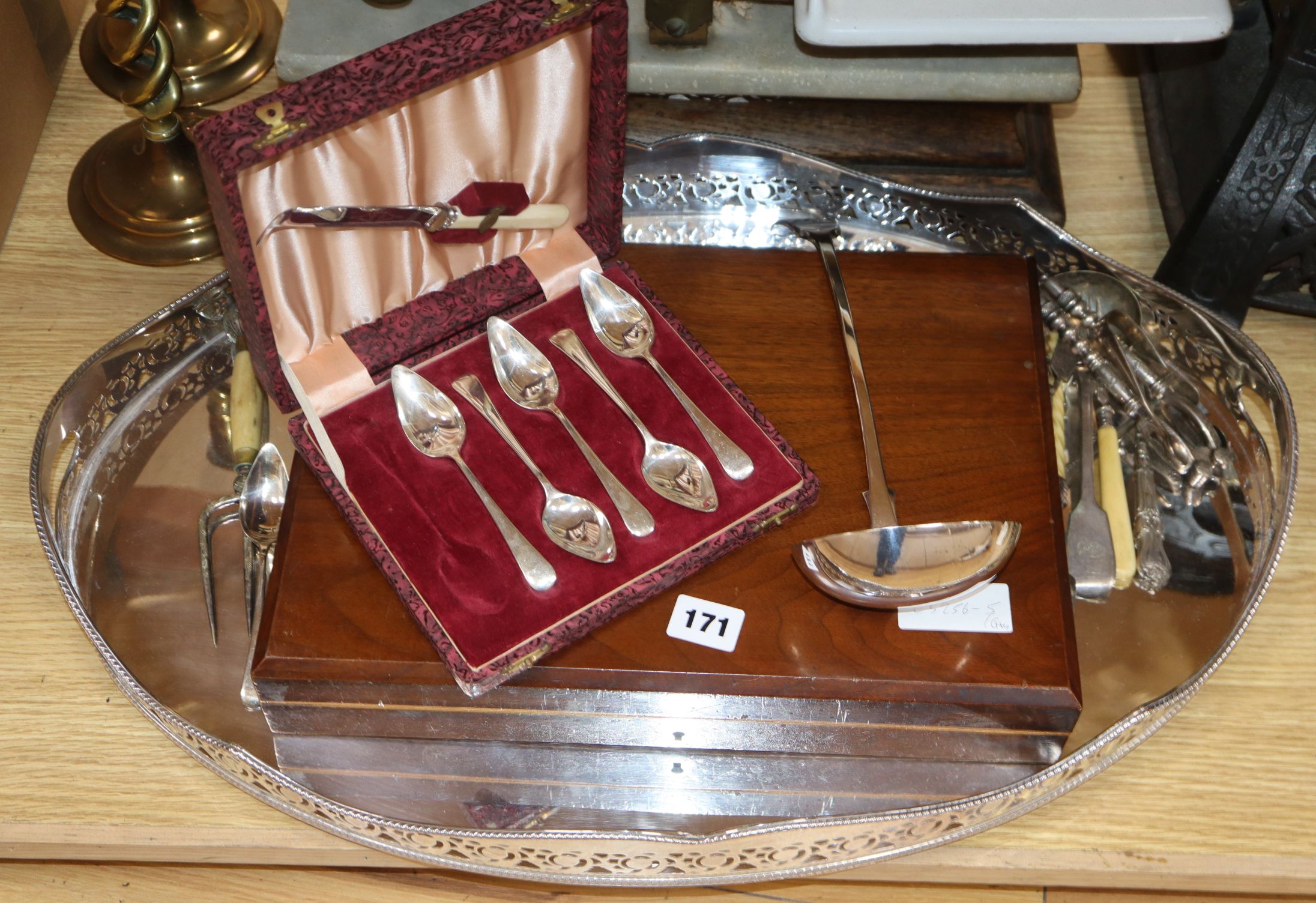 A plated oval tea tray and assorted plated cutlery including cased sets.