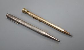 A 9ct gold cased pencil and a silver Yard-O-Lead pen.