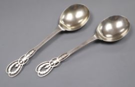 A pair of George V silver serving spoons with pierced terminals, Adie Bros, Birmingham, 1924, 22.