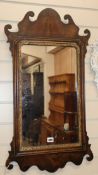 A George III style fret cut wall mirror W.45cm