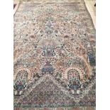 A Persian ivory ground tree of life carpet 210 x 310cm