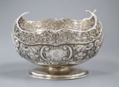 An Edwardian embossed and pierced silver boat shaped bowl, London, 1902?, height 11.5cm, 8 oz.