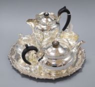 A four piece plated tea set and a salver