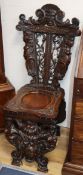 A French walnut Mannerist style hall chair