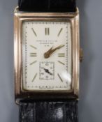 A gentleman's stylish 1930's 9ct gold manual wind wrist watch, retailed by Dibdin & Co, with