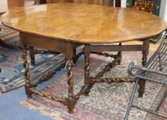 An 18th century and later fruitwood gateleg dinner table W.176cm