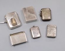 A George V silver patent Auto Matchbox',Wright & Davies, London, 1920, four other silver vesta cases