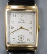 A gentleman's 1950's 9ct gold Record manual wind wrist watch, with rectangular Arabic dial and