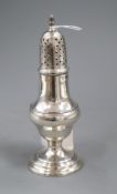 A George III silver baluster pepperette, by John Mewburn?, London, 1799, 15.2cm.