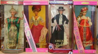 Four Barbie costume dolls, mint and boxed