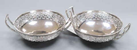 A pair of George V pieced silver two handled bonbon dishes by Asprey & Co, London, 1912, 13.5cm